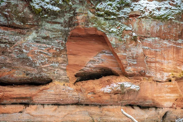 Sandstone cliffs with natural caves — Stock Photo, Image