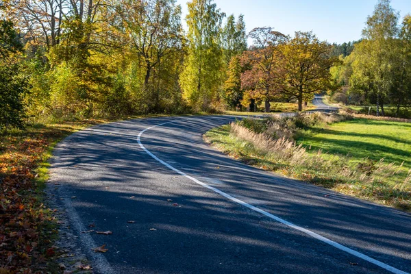Empty gravel road in autumn — Stock Photo, Image