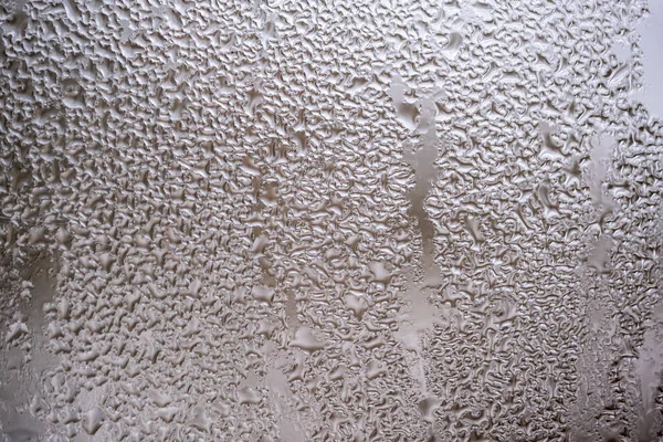 Krople deszczu na szybę okienną — Zdjęcie stockowe