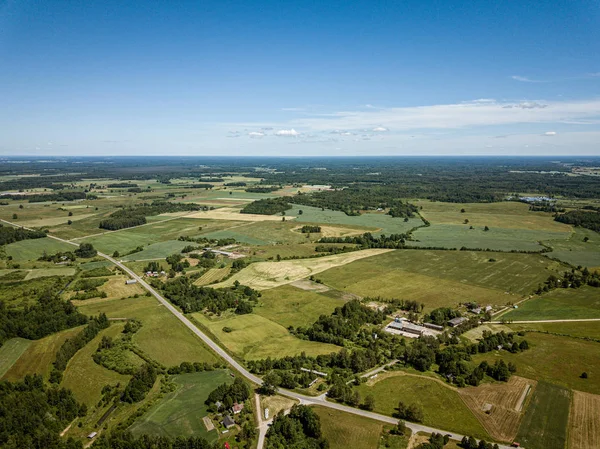 Countryside roads and fields with small village. aerial view — Stock Photo, Image