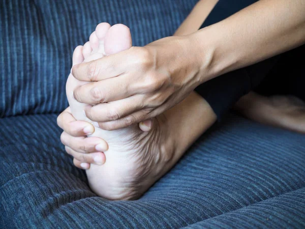 Chronic body aches with feet pain and foot inflammation or plantar Fasciitis. Medical health care concept.