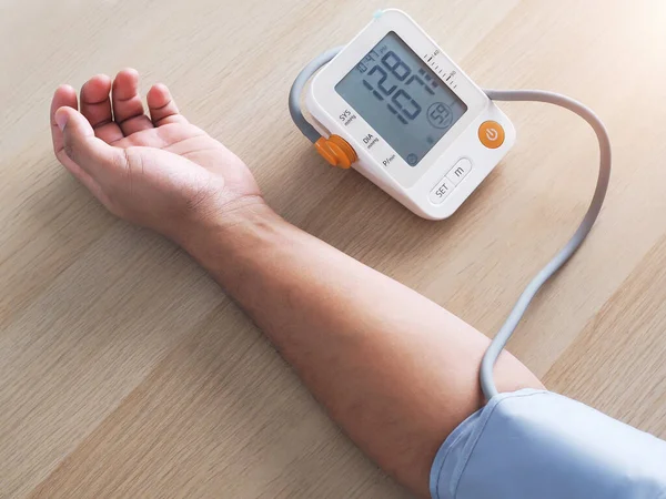 Checking Health Digital Blood Pressure Monitors Royalty Free Stock Photos