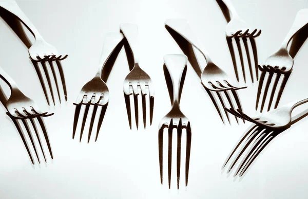 Forks Haphazardly Placed Illuminated Create Different Shades Selenium Toning Tone — Stock Photo, Image