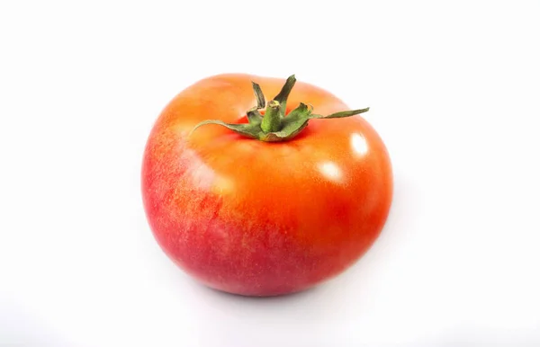 Hybrid aus Apfel und Tomate auf weißem Hintergrund. — Stockfoto