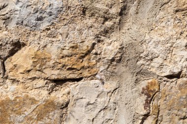 Eski bir evin taş duvar parçasından doğal arka plan