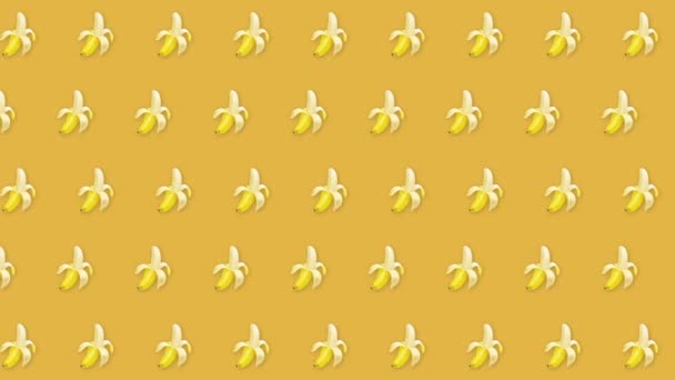 Diseño de movimiento banana. Un elemento animado plátano sobre fondo amarillo . — Vídeo de stock