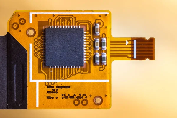 Flex ribbon cable chip from mobile phone. Touch screen controller.