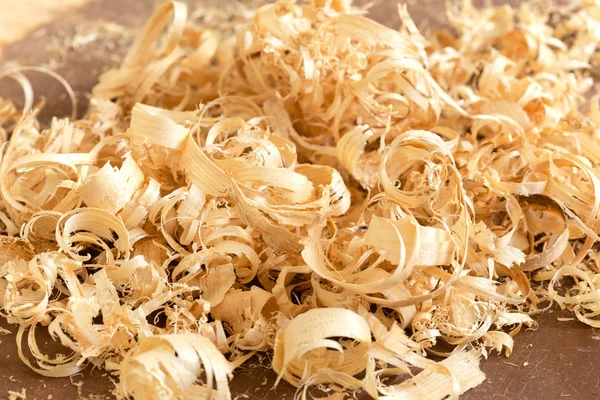 Close up view on wood shavings. Abstract background. — Stock Photo, Image