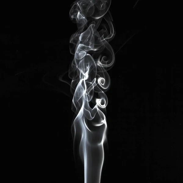 Abstract white smoke swirls pattern over the black background — Stock Photo, Image