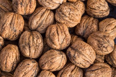 Ceviz. Tam ceviz arkaplanı. Çok fazla ceviz var. Ceviz dokusu.