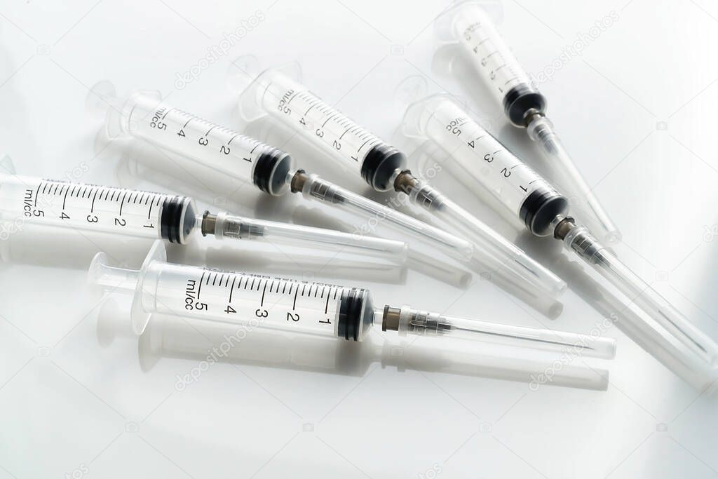 syringes on the table injection medicine pharmacy