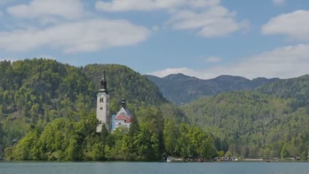 Igreja Bled Hyperlapse 4K Ultra alta definição. Bled é um lago na Eslovénia Alpes — Vídeo de Stock