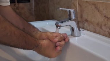 Koronavirüsü ya da ağır çekimde yıkanan ellerle kovid19 salgını önler.