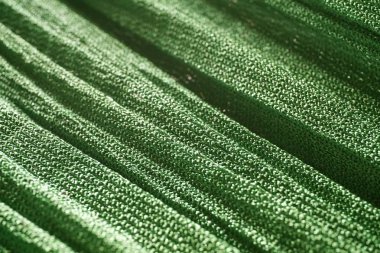 Yeşil tekstil dokusunu kapat