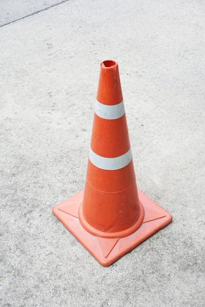 close up Orange cone on the road