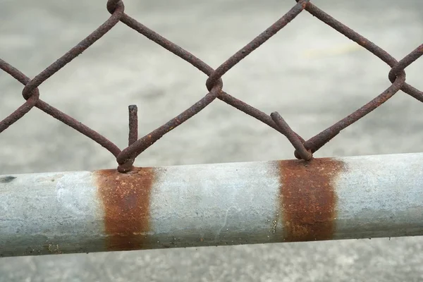 close up rusty iron net