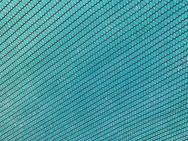 close up green fabric net texture