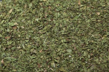 Yakın plan yeşil kurutulmuş nane arkaplanı.