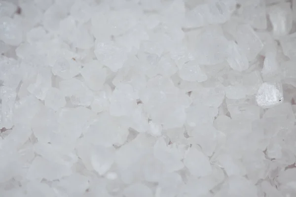 Close-up white rock salt background.