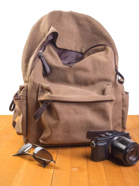 Travel backpack, camera and glasses on a white background — Stock Photo, Image