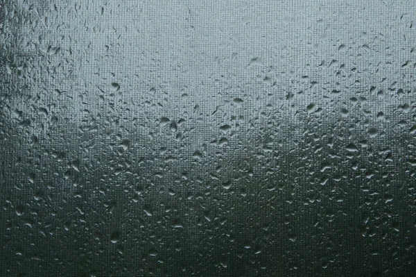 Okno Dużymi Kroplami Deszczu Podczas Ulewnego Deszczu — Zdjęcie stockowe