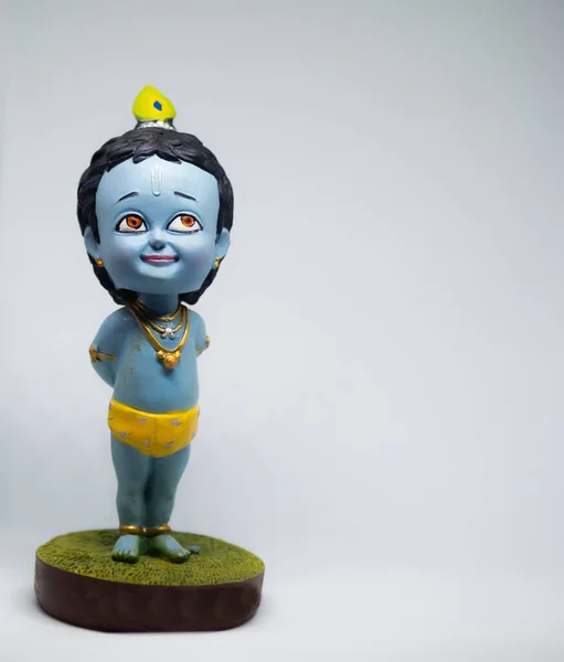 Hindu tanrısı Krishna 'nın beyaz geçmişi olan ve sol eğilimli bir çocuk olarak sevimli ve masum idolü. Janmashtami sırasında kutlandı. Düzenlenebilir, afiş, poster