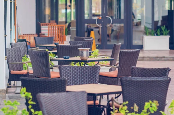 Outdoor furniture in the restaurant, tables and chairs