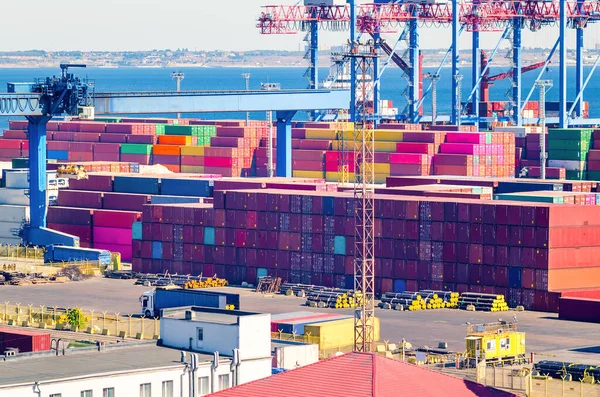 Stacked cargo containers in storage area of freight sea port — Stock Photo, Image