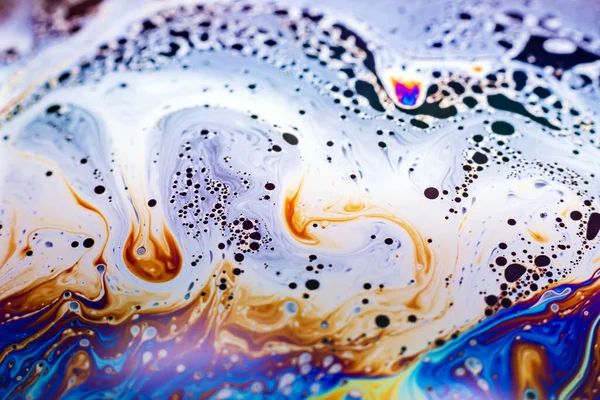 Beautiful psychedelic abstraction formed by light on the surface of a soap bubble.