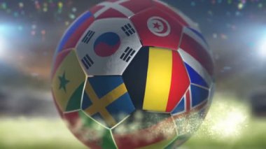 Stadyumda futbol topu üzerinde Belçika bayrağı