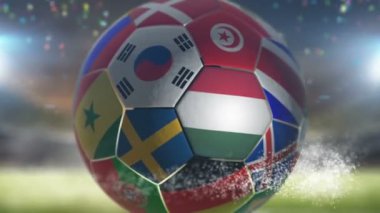 Stadyumda futbol topu üzerinde hungary bayrağı