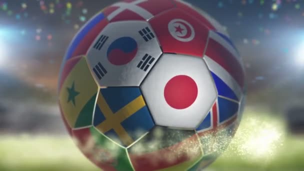 Japan flag on a soccer ball football in stadium — Stock Video