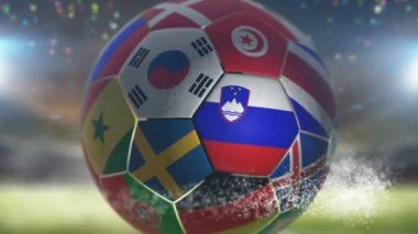 Stadyumda futbol topu üzerinde Slovenia bayrağı