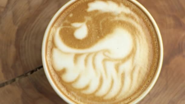 Łabędź latte sztuka top widok tekstury kawy pianka kawiarnia reklama — Wideo stockowe