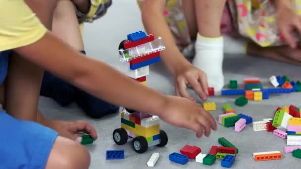 Close up kids playing with block toys — Stock Video