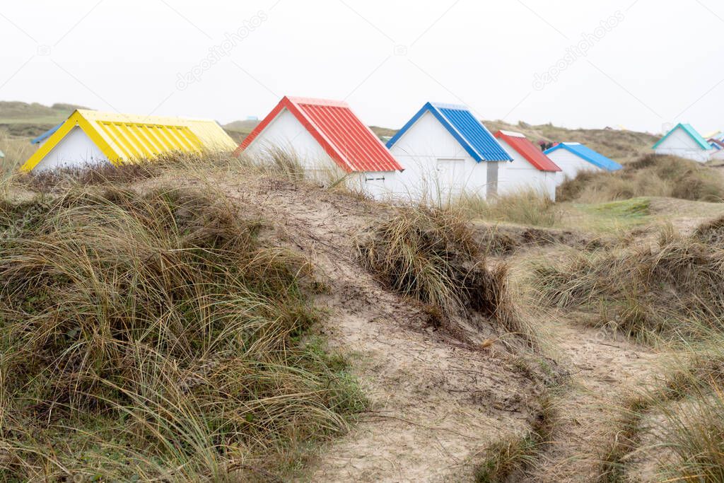 Gouville, France - 12 30 2018: Colorful bathing cabins of Gouvil