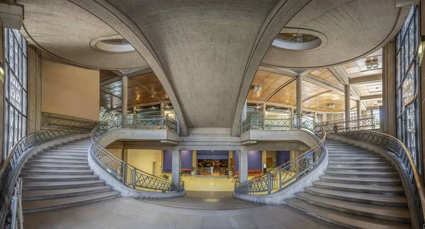 Paris, France - 09 09 2025: Palais d'Iena. Front view of the monumental double-spiral staircase, in the shape of a heart or horseshoe, and its banister created by the ironworker Raymond Subes