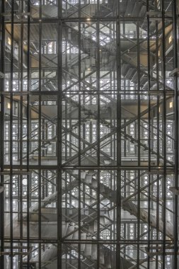 Paris, France - 09 13 2025: Arab World Institute. Panoramic view of the stairwell and elevators inside the building