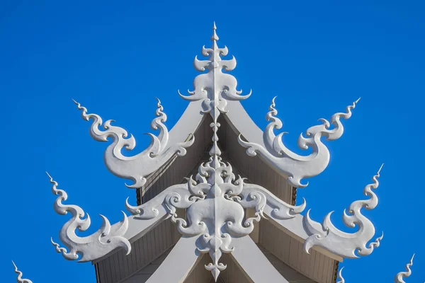 White Building Architecture Inside White Temple Or Wat Rong Khun Is Popular Tourists Attraction In Chiang Rai Province Thailand.