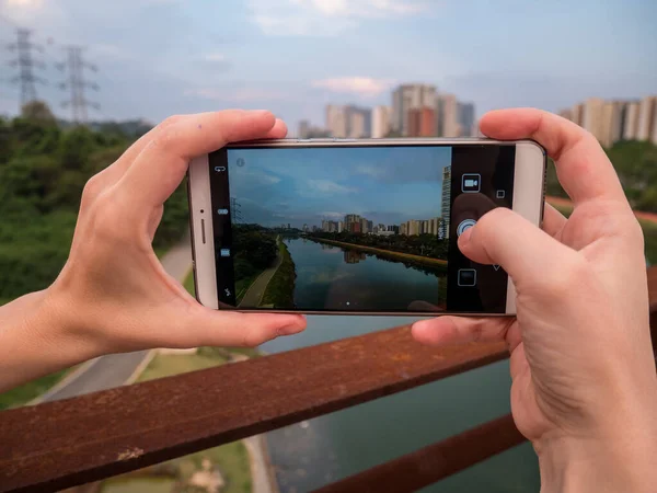 Taking a mobile snap from laguna Bridge