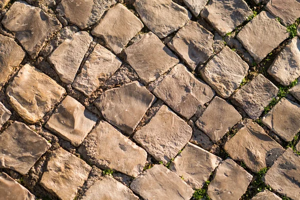 Pavement of old brick in streets of Faro.