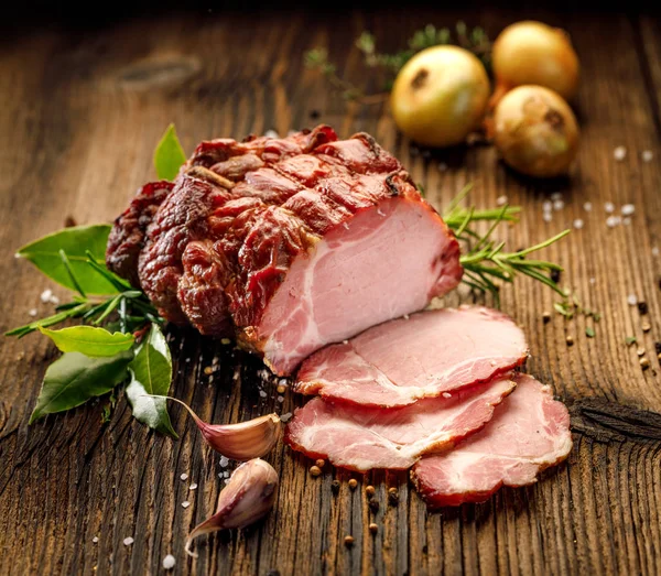 Sliced Smoked Gammon Wooden Table Addition Fresh Herbs Aromatic Spices — Stock Photo, Image