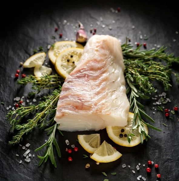 Fresh Raw Cod Fillet Addition Herbs Lemon Slices Black Stone — Stock Photo, Image