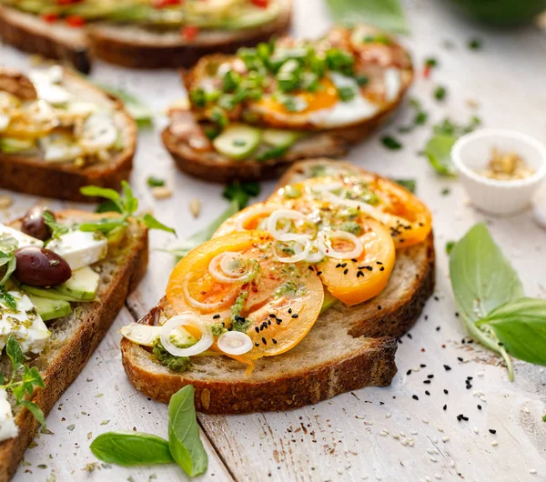 Assorted Open Faced Sandwiches Middle Board Open Avocado Sandwich Made — Stock Photo, Image