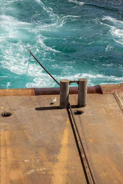 NORTH SEA NORWAY - 2015 MAY 24. Anchor Handler Tug Vessel AHTS towing a semi-submersible drilling rig