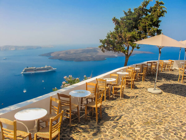 SANTORINI, GREECE - 2013 august. Restaurant with view over the Santorini Greece ocean.