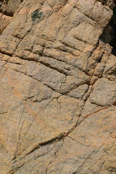 Texturen av den naturliga stenen bakgrund utomhus, mönster — Stockfoto