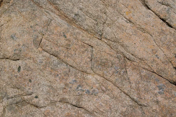 Texturen av den naturliga stenen bakgrund utomhus, mönster — Stockfoto