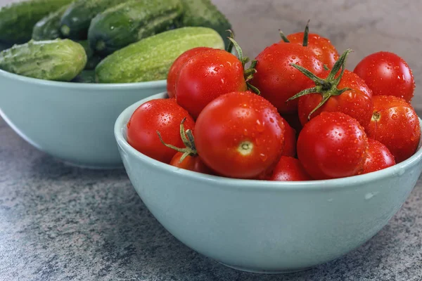 top view of freshly picked tomatoes and cucumbers. The concept of ecologically clean food