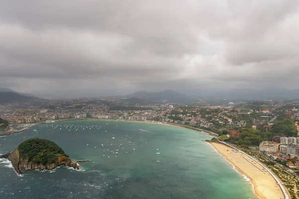 top view of the bay and spanish city of san sebastian on a cloudy summer day